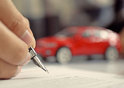 Pen and red car