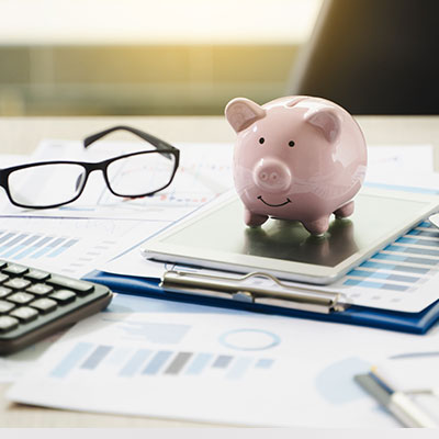 Piggy bank on tablet