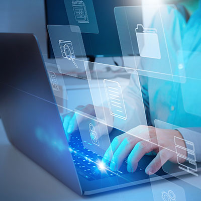 Laptop and holographic icons