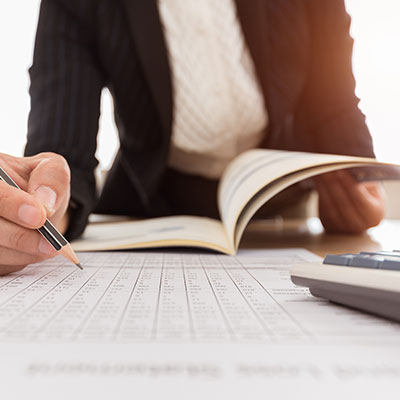 Businesswoman writing